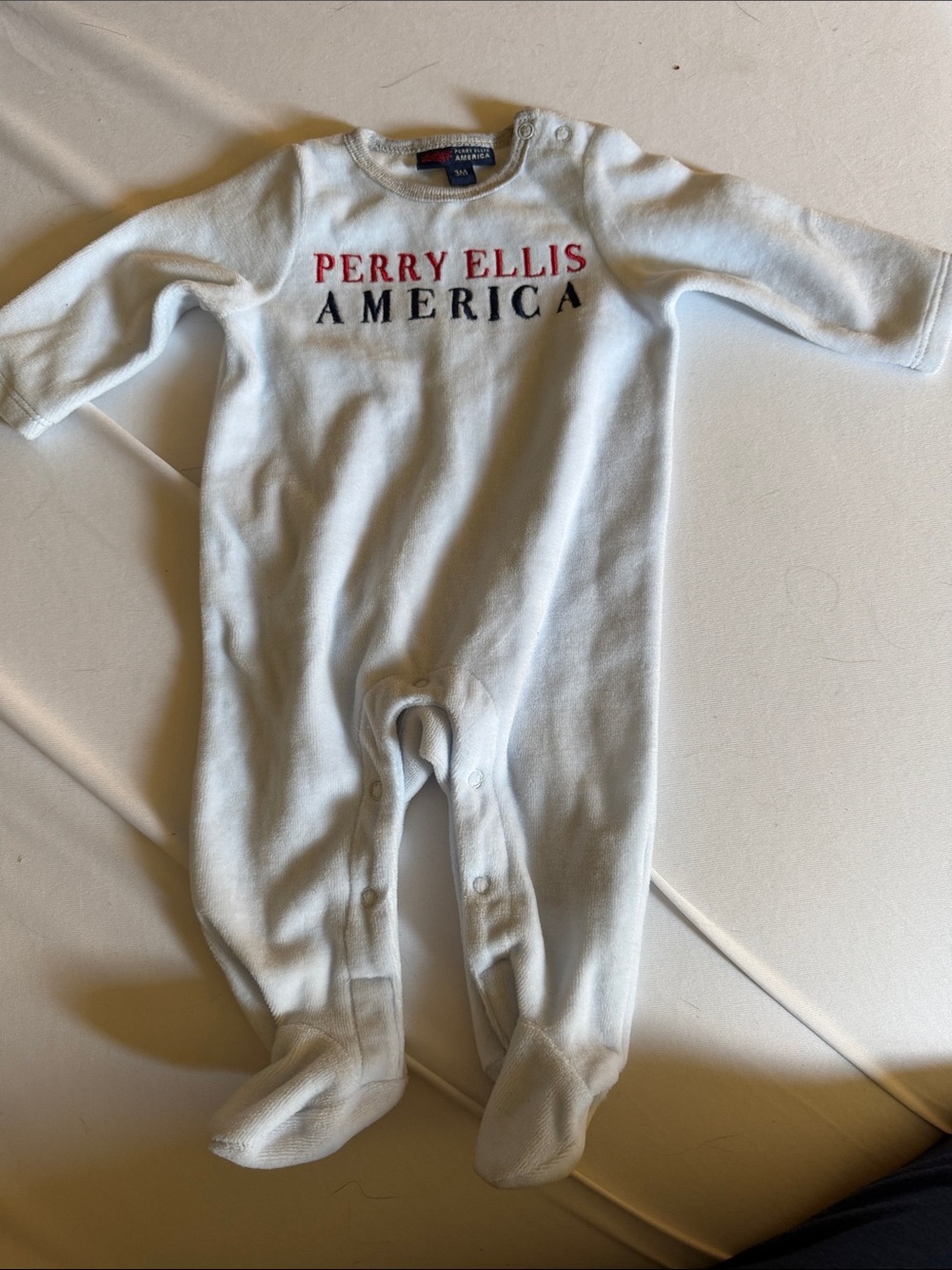 Perry Ellis White Footed Baby One-Piece with Red & Navy Logo
